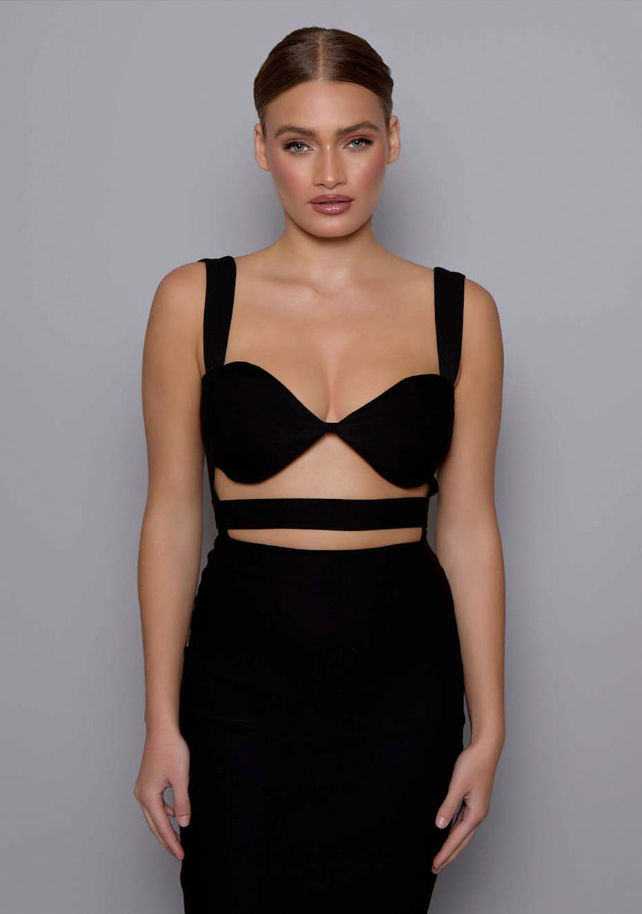 Close-up of the VSPR Solene dress showcasing the structured sweetheart neckline and under-bust cut-out details, highlighting the premium stretch fabric and precise stitching.
