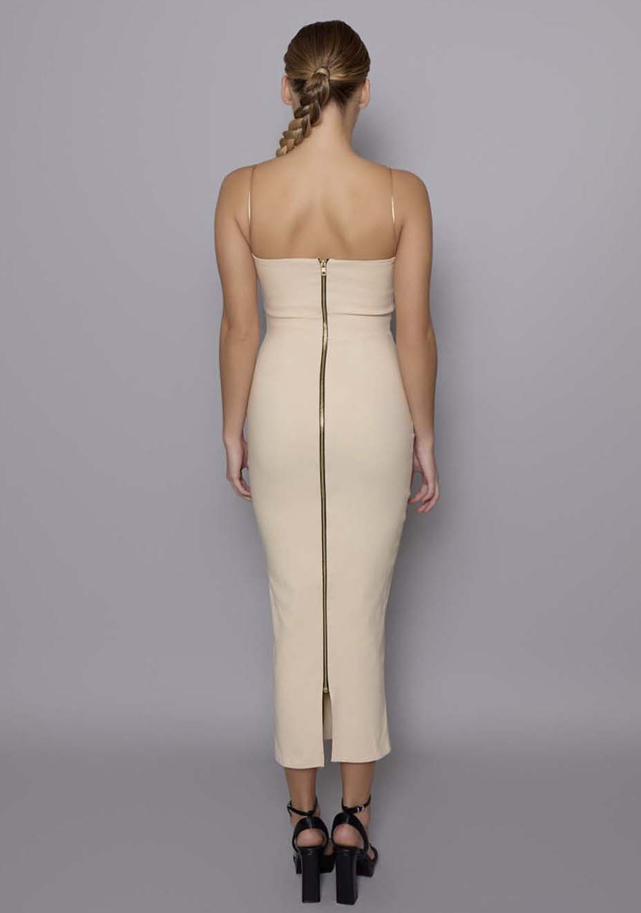 Back view of the VSPR Viola stone midaxi dress featuring thin adjustable straps and a full-length gold zip closure, emphasizing its sleek silhouette and open-back elegance.