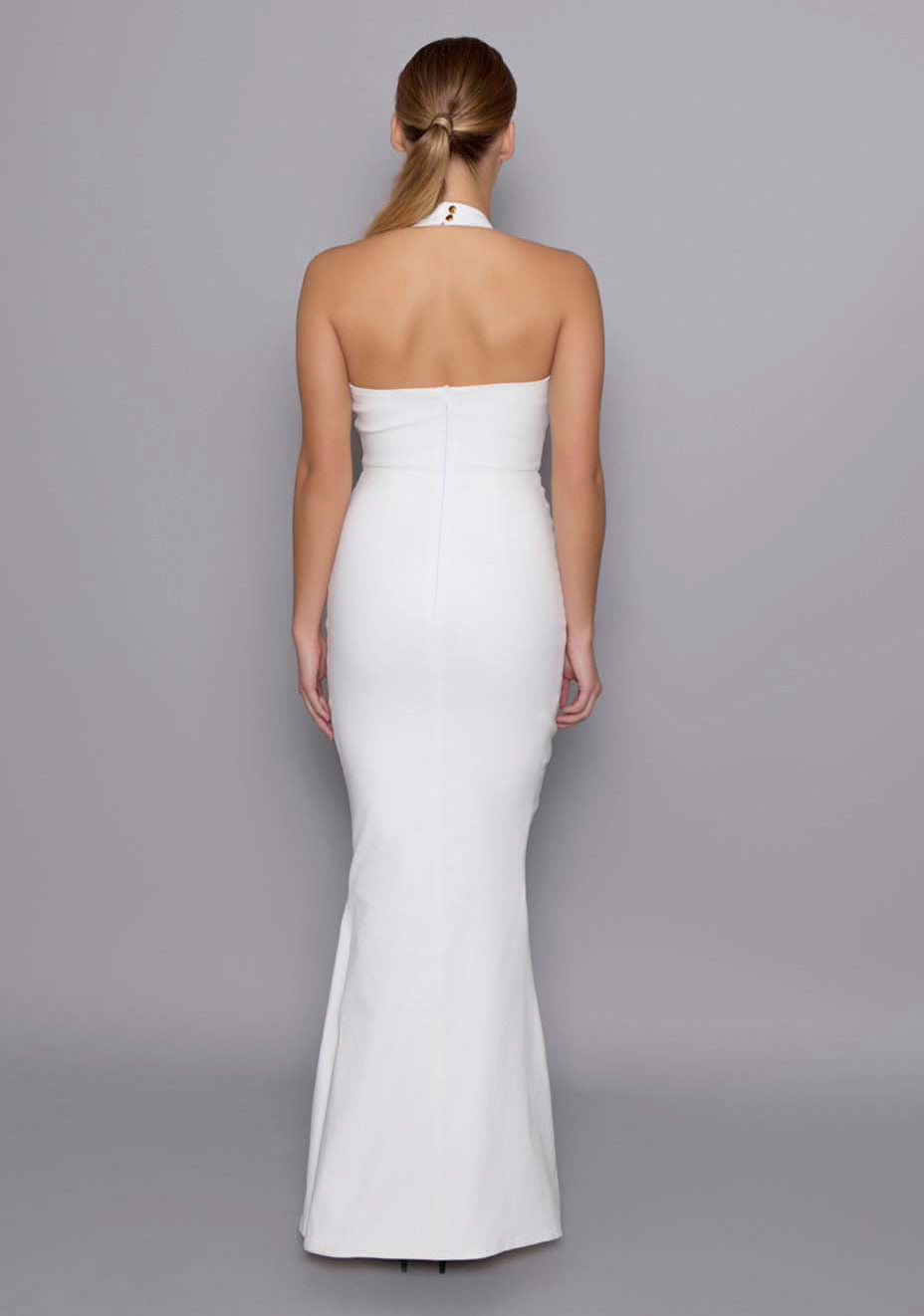 Back view of the VSPR Zara fishtail gown featuring the sleek open-back halter design, sculpted bodice fit, and flowing fishtail skirt.