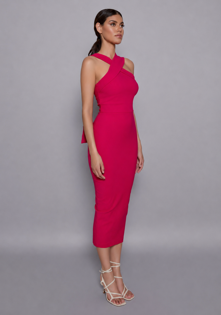 Side-front view of the Vesper Everest Cerise Midaxi Dress showing the contoured fit, structured collar, and sculpting effect along the waist and hips.
