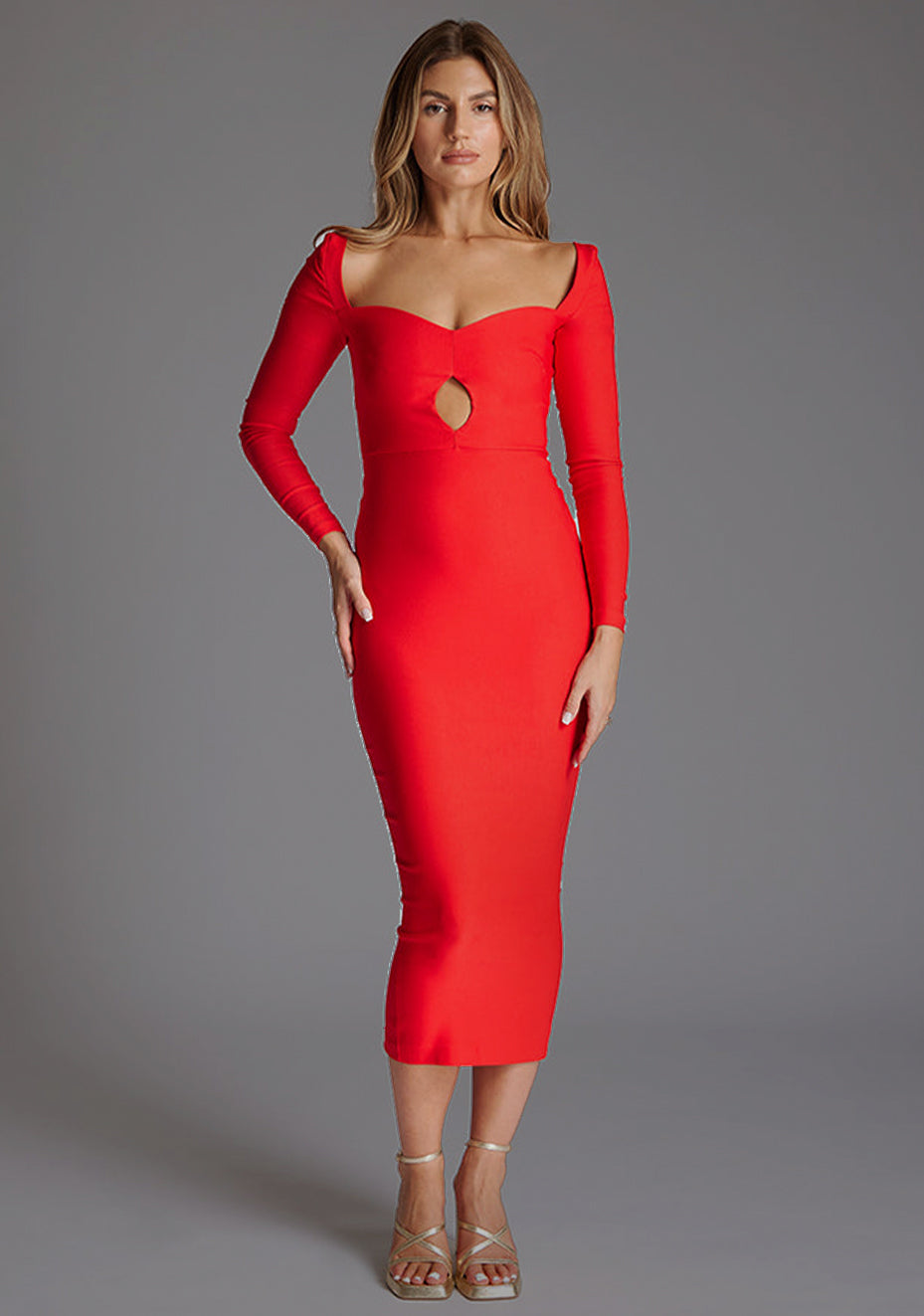 Front image of a model wearing the Vesper Amy Sweetheart Neckline Long Sleeve Midaxi Dress in Red, featuring a classic sweetheart neckline, elegant long sleeves, and a slim-fit midaxi silhouette, against a grey studio backdrop.