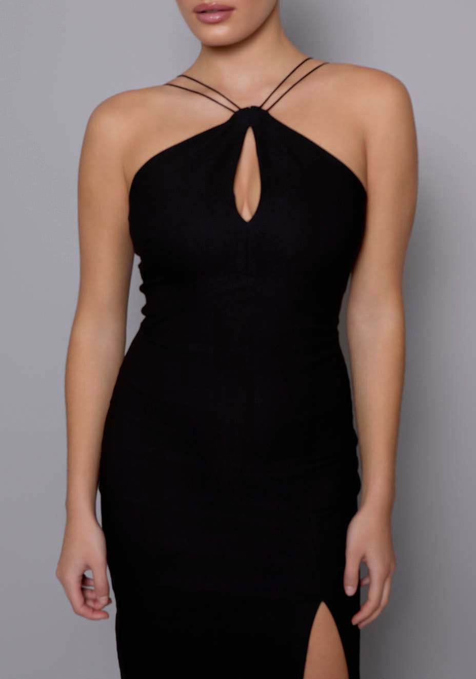 Close-up of the VSPR Auralia dress highlighting the signature stretch-structured fabric, delicate crossover halter straps, and precision keyhole cut-out at the bust.