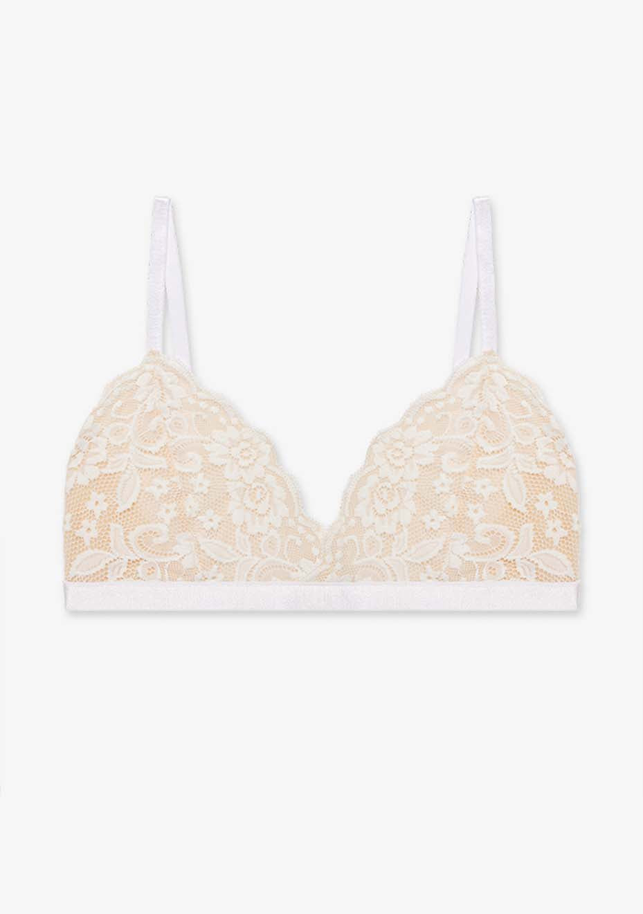 Orla bra in stone and white, featuring lace fabric with intricate flower embroidery, shown against a neutral backdrop.