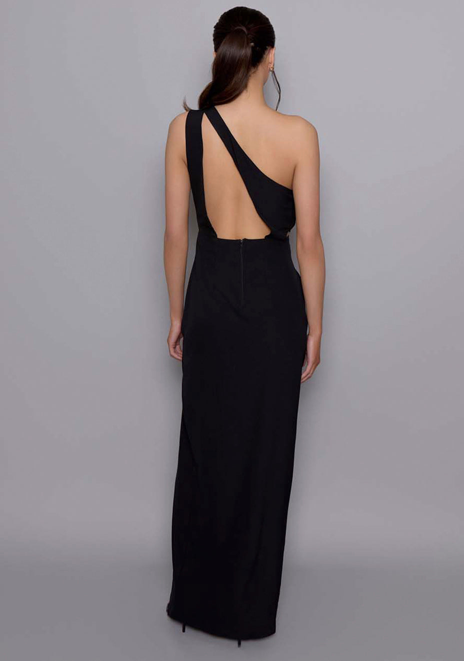 Back view of the VSPR Vanessa dress showing the clean open back and softly draped shoulder panel, revealing the minimalist elegance and precise tailoring of the design.