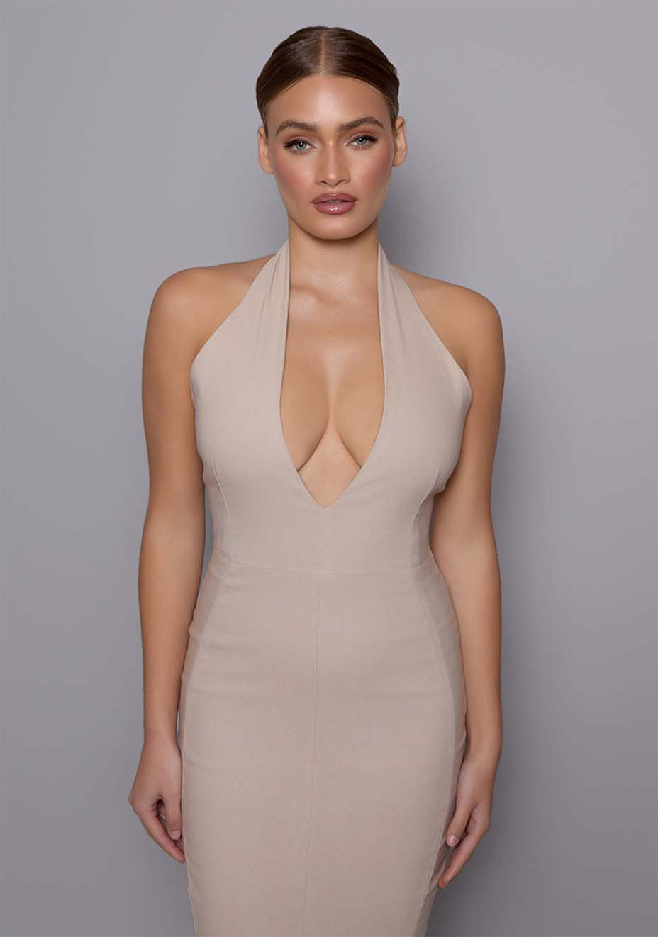 Close-up of the VSPR Zara Fishtail Maxi Dress, highlighting the plunging halter neckline, contoured bodice, and soft, structured fabric for a perfect fit.