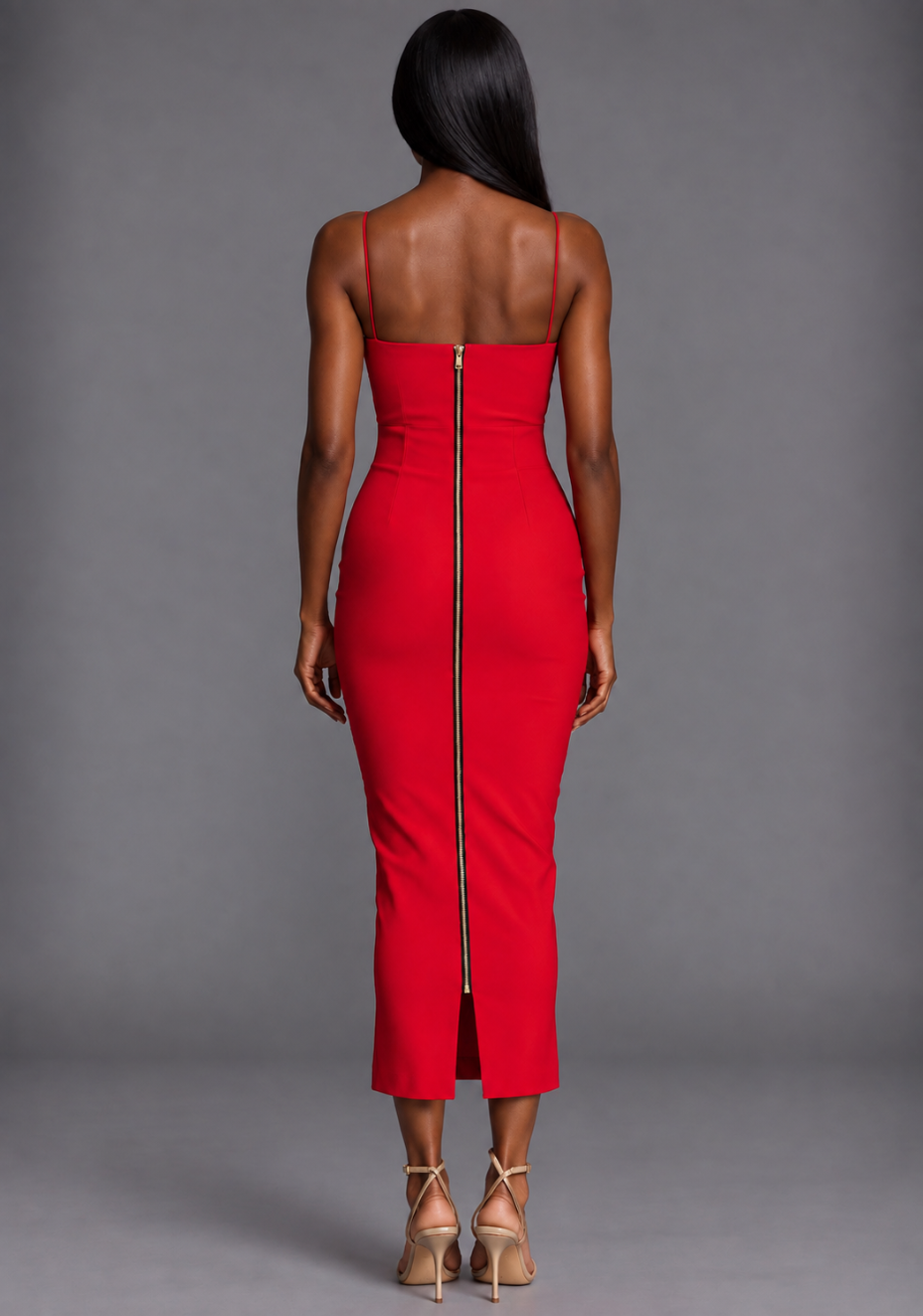 Back image of a model wearing the VSPR Whitney Red Midaxi Dress, highlighting its smooth bodycon shape and vibrant red finish as the model stands against a grey studio background.