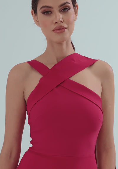 Model posing and turning in the VSPR Everest cerise midaxi dress, showcasing the sleeveless design, slim bodycon fit, and elegant collar detail. The dress falls to a midaxi length, moving gracefully as the model walks, highlighting its refined silhouette and premium fabric—perfect for formal occasions or evening events.